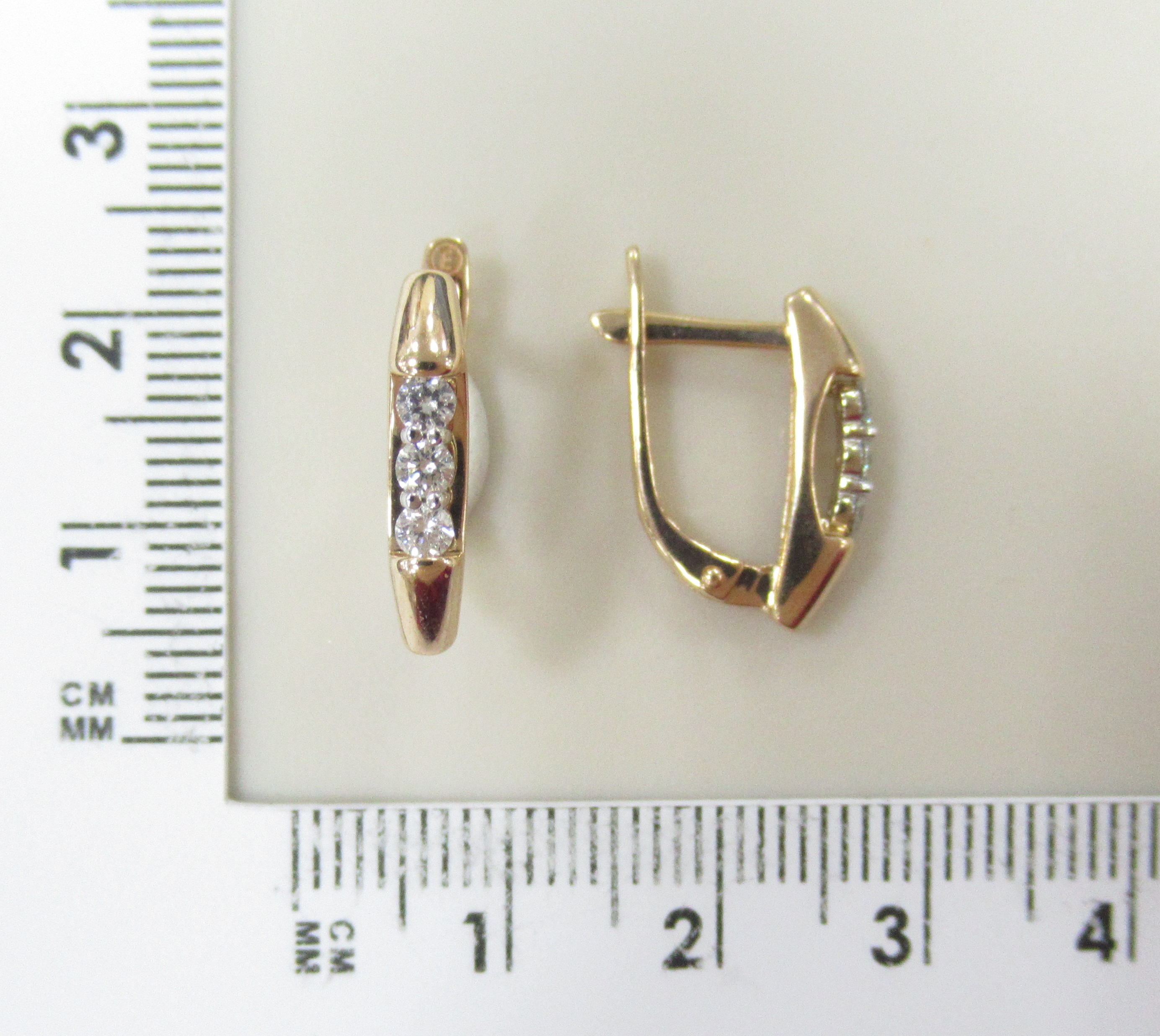 Золотые серьги 585 пробы; родий; вставки 6 Бр.Кр-57 3/7А 0,302
